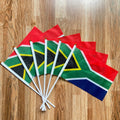 Pack of ten small South African hand flags on white poles