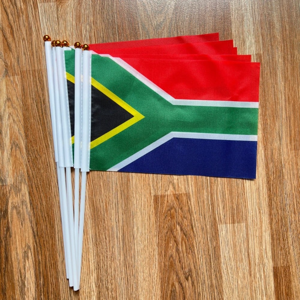 Pack of ten small South African hand flags on white poles