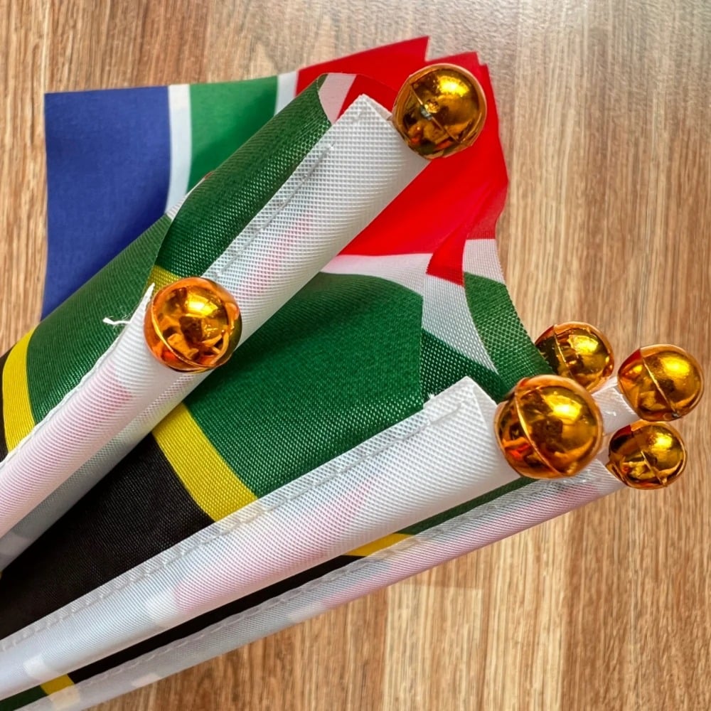 Pack of ten small South African hand flags on white poles