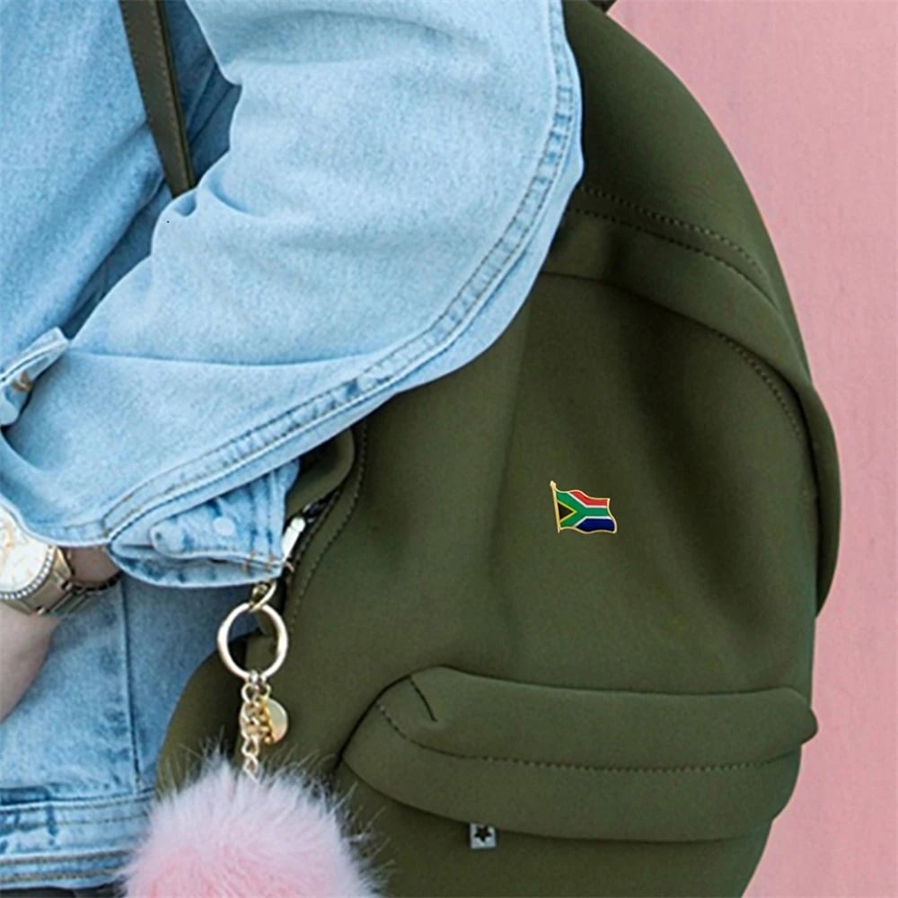 South African flag lapel pin with gold edging and a butterfly clutch back